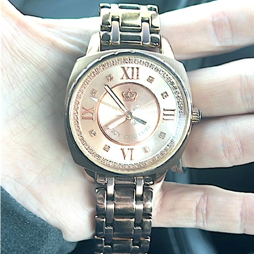 JC large round watch w/ Swarovski crystals, rose gold. Is a folding clasp band.